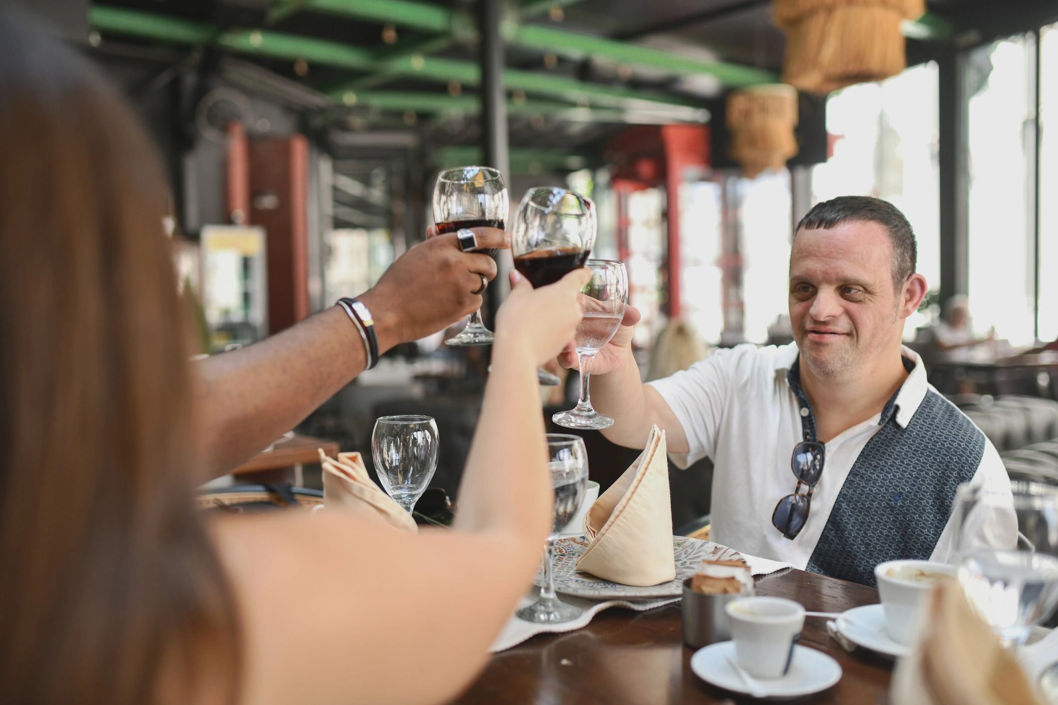 Friends toasting at a table