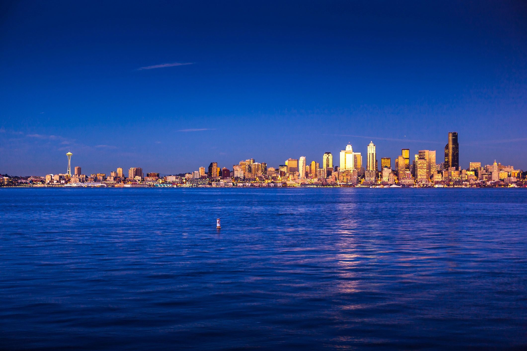 Seattle skyline at sunset over the water